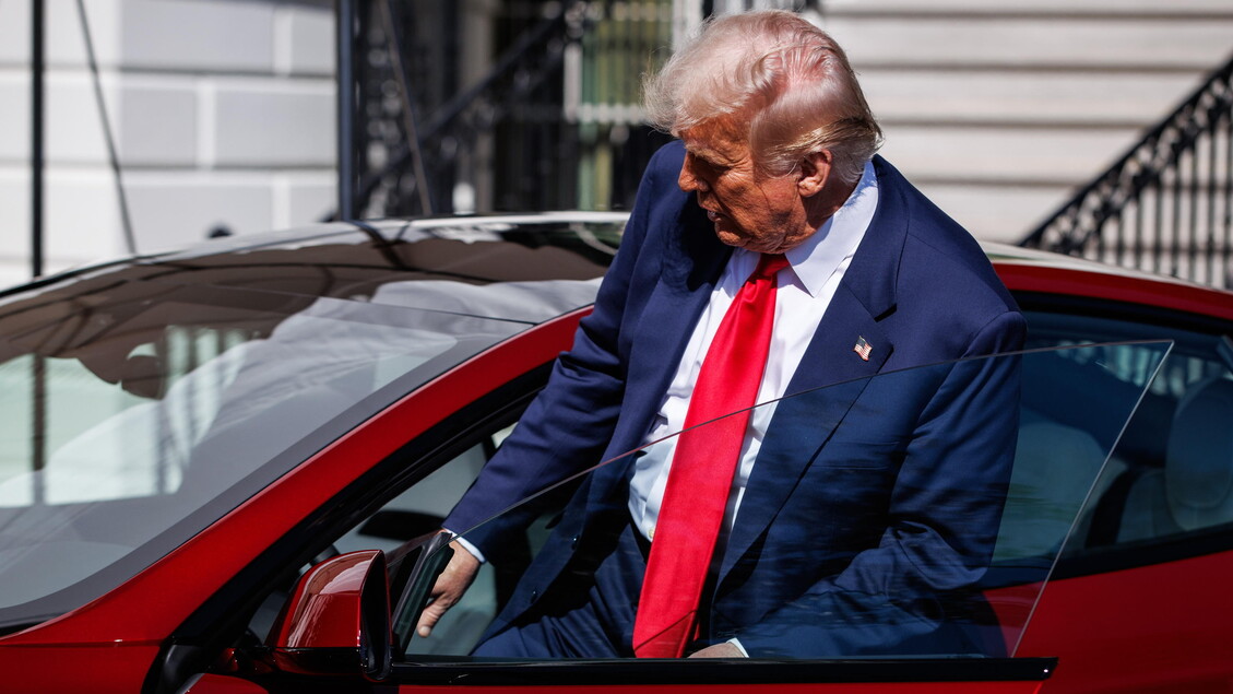 US President Trump views Tesla vehilces in front of the White House