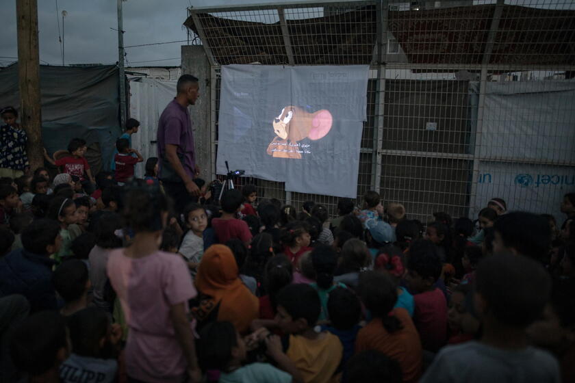 Palestinian man sets up cinema for children at Rafah camp, southern Gaza